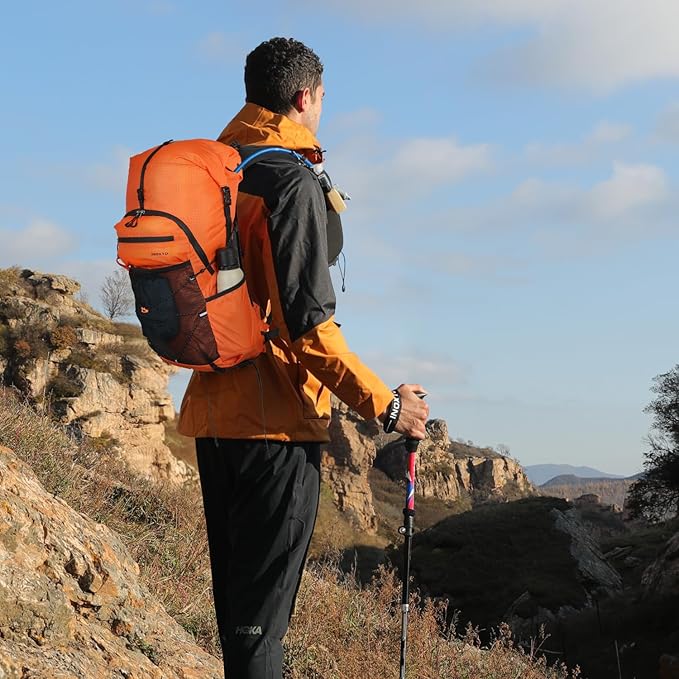 Hiking Backpack for Men and Women, 30L Waterproof Camping Backpack with 3L Water Bladder and Rain Cover, Lightweight Outdoor Sport Travel Daypack Rucksack for Climbing Cycling (Orange)