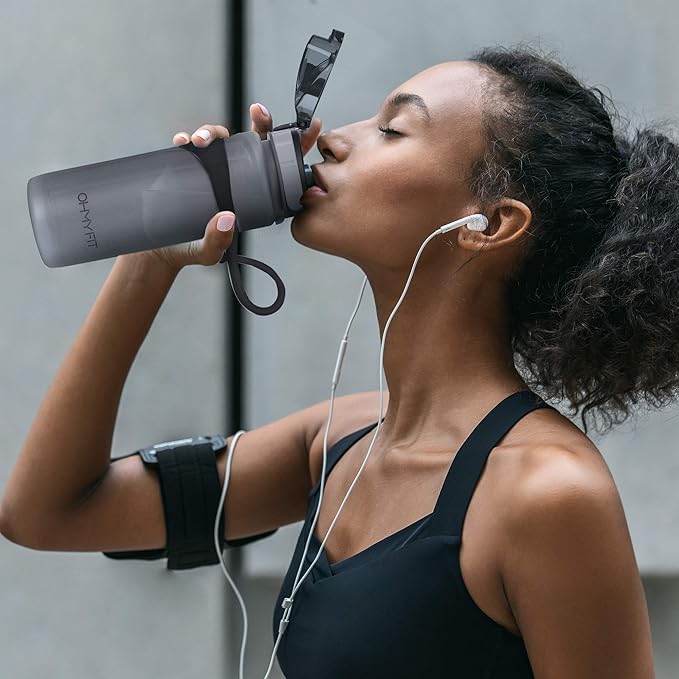 Tritan Sports Water Bottle with Magnetic Silicone Carry Strap & One Click Open Cap - Magnetic Drink Holder for Metal Equipment - Bottle w/Straps for Backpack, Belt & More (30oz, Onyx Black)