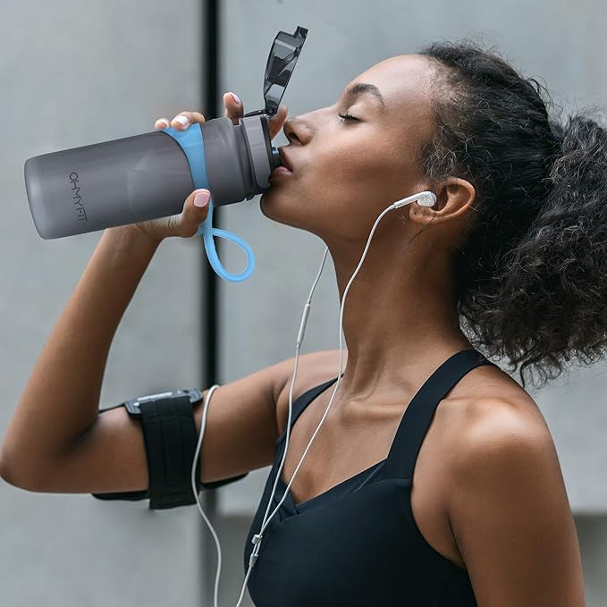 Tritan Sports Water Bottle with Magnetic Silicone Carry Strap & One Click Open Cap - Magnetic Drink Holder for Metal Equipment - Bottle w/Straps for Backpack, Belt & More (30oz, Sky Blue)