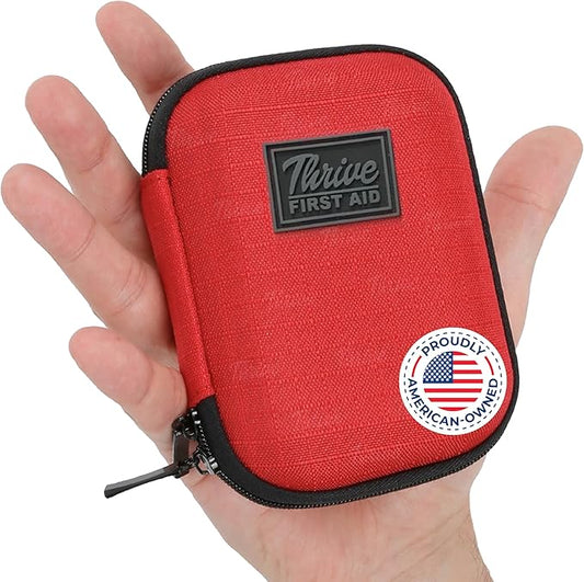 Thrive Travel Essentials Mini First Aid Kit - 66-Piece, Red Shell Case - Hiking, Camping & Cruise Essentials - Mini Medicine Kit